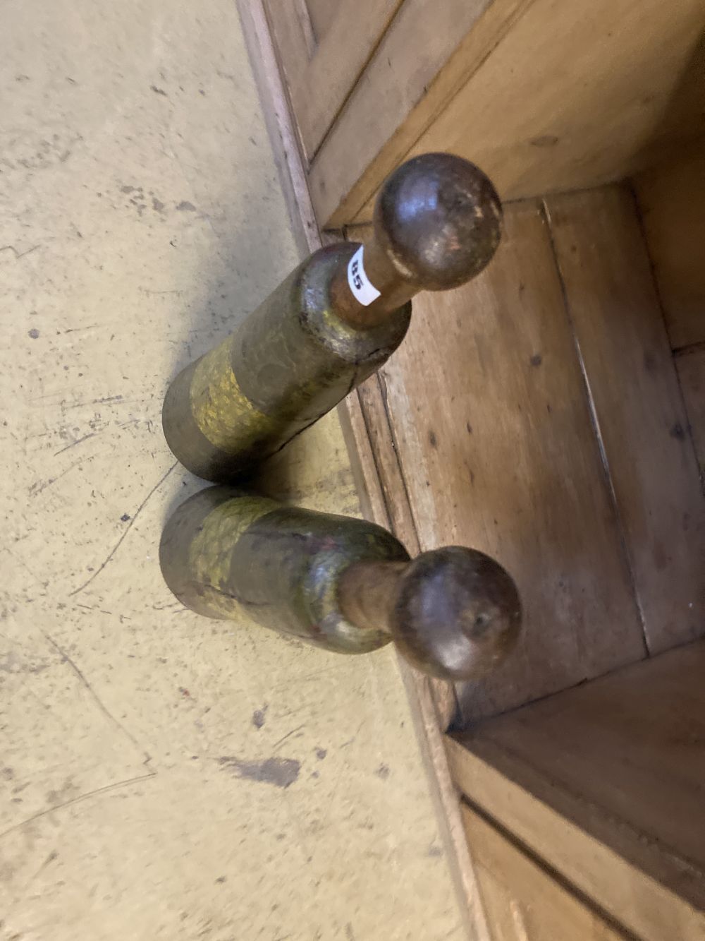 A pair of 19th century Continental painted wood skittles, height 66cm